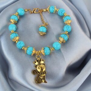elegant turquoise beaded bracelet with gold cat charm